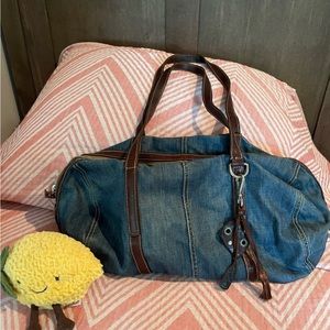 Denim miu miu. Very rare! Gorgeous. No call outs.